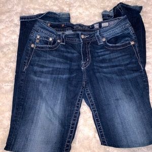 Buckle miss me mid rise easy boot jeans